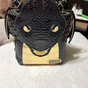 Loungefly Black and Gold Dragon Face Backpack